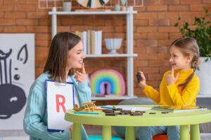 school-based speech-language pathologist working with student