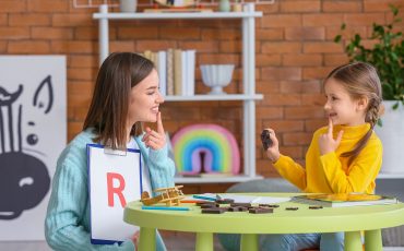 school-based speech-language pathologist working with student