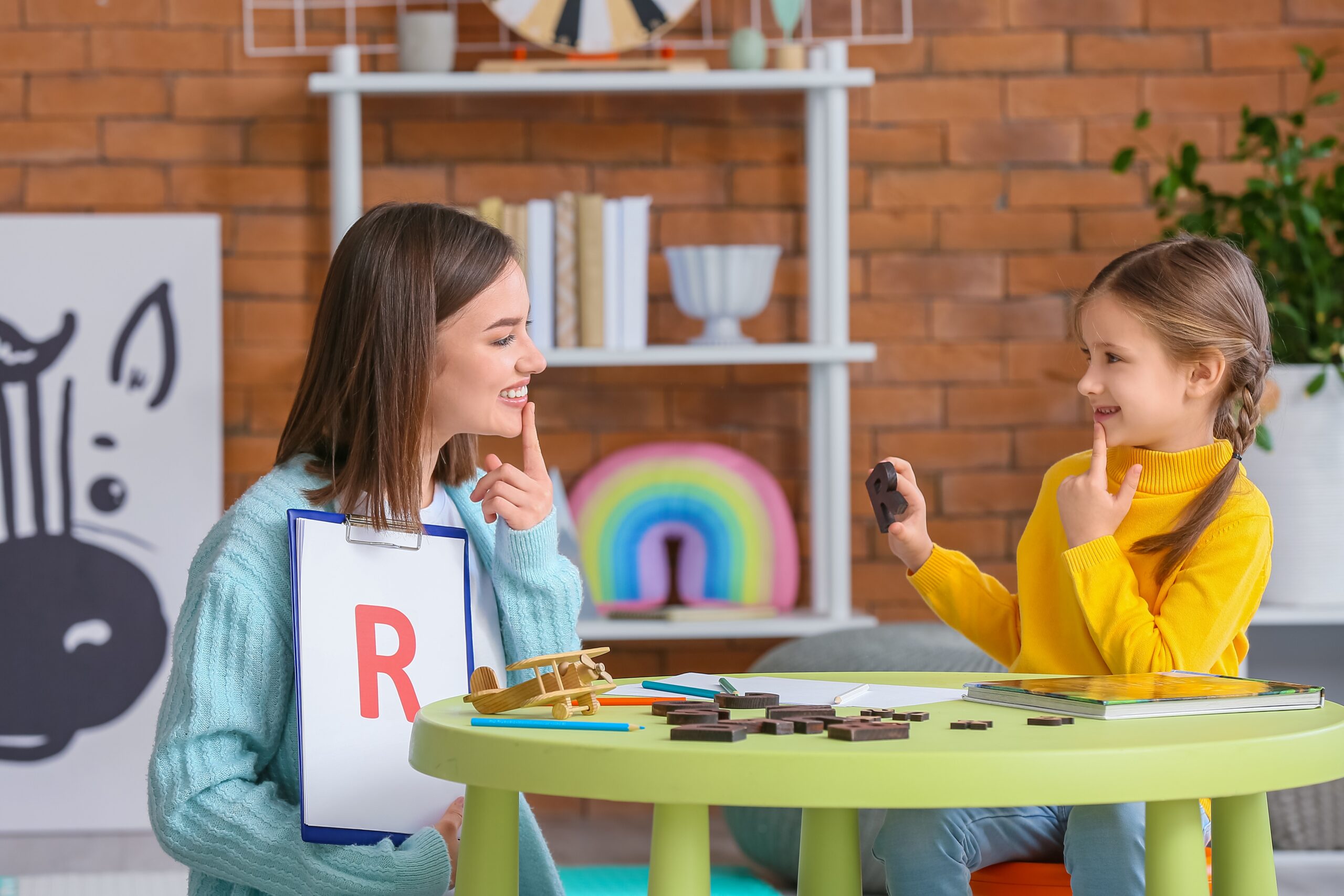 school-based speech-language pathologist working with student