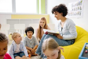 Teacher managing classroom behavior with storytime